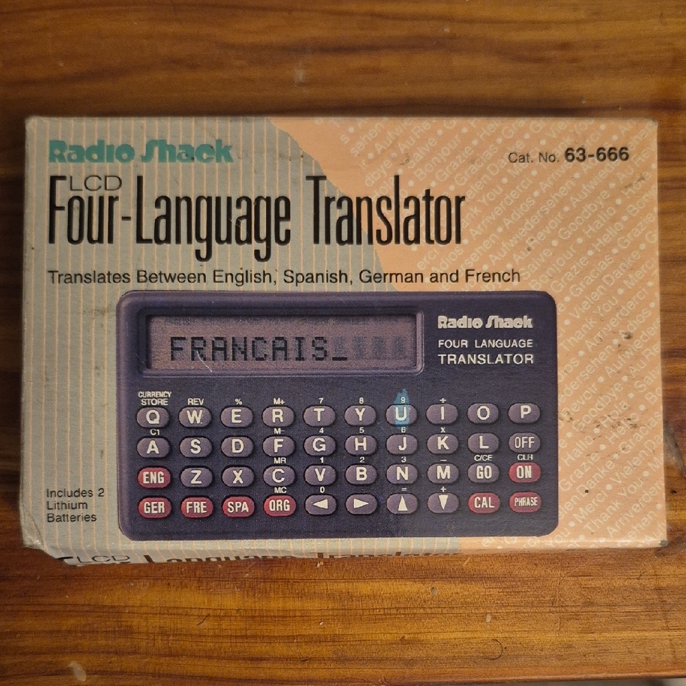 new Vintage RADIO SHACK 4 Language Translator + Calculator & Currency Converter